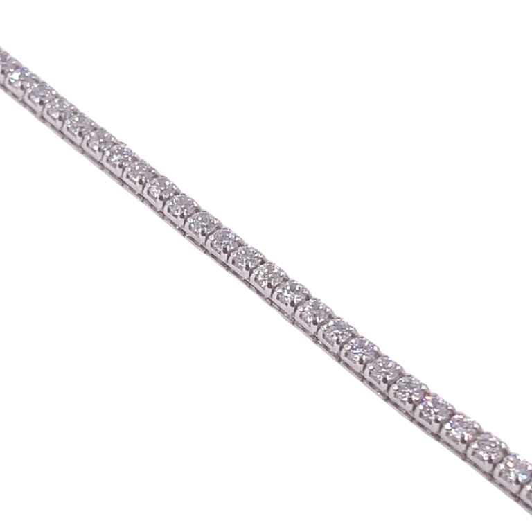 bracciale donna modello tennis argento e zirconi bianchi montatura a giorno 4 griffes. chiusura a moschettone. visuale sezione incassatura 4 griffes