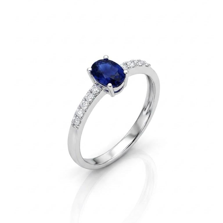 Emerald Ring in White Gold and Diamonds