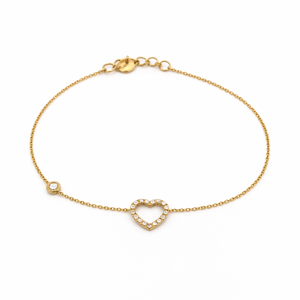 Bracciale Donna cuore oro giallo e diamanti naturali ct.0,10